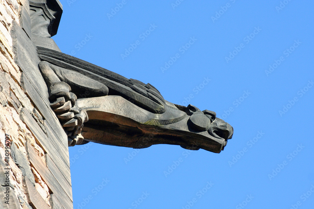 Gargoyle on the edge of a tower of Edinburgh's castle.