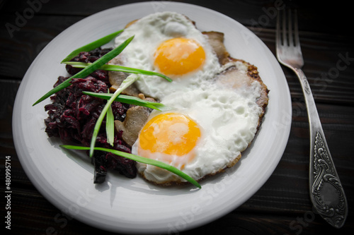 Breakfast fried eggs in lard