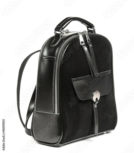 Black leather woman's suede backpack isolated on white background