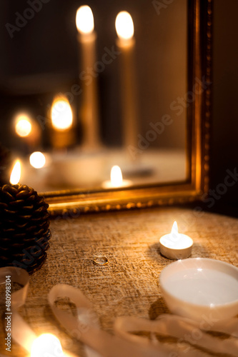 Candles, a ring and a fortune-telling mirror