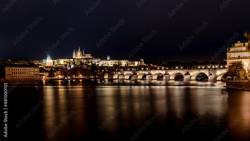 Fototapeta premium Prague Charles bridge and castle at night, panorama, Czech Republic.