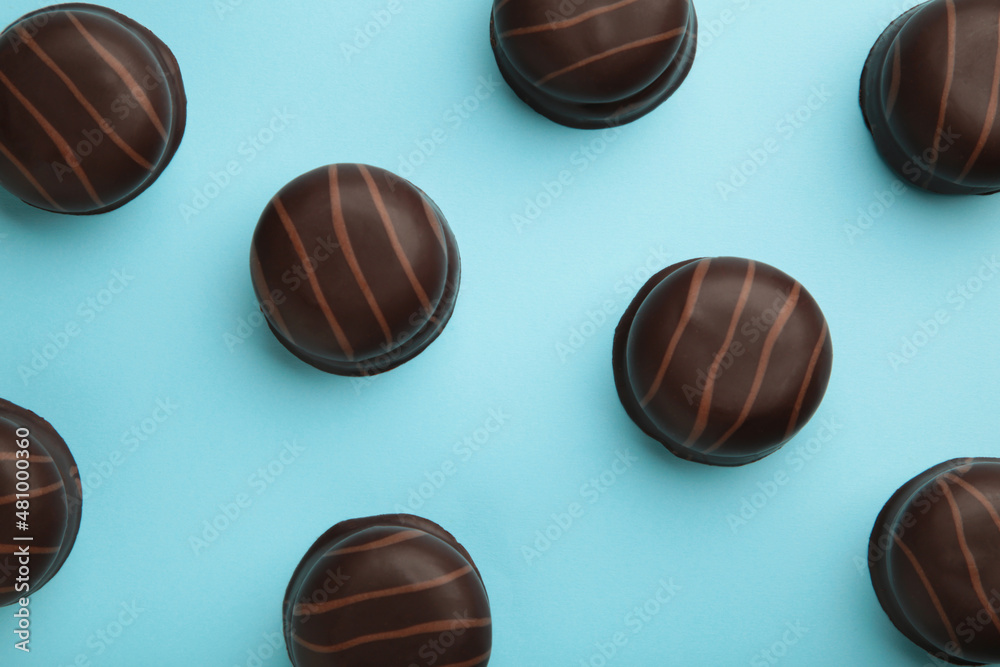Chocolate sweets on a blue background. Biscuit Chocolate sweets on a blue background. Biscuit