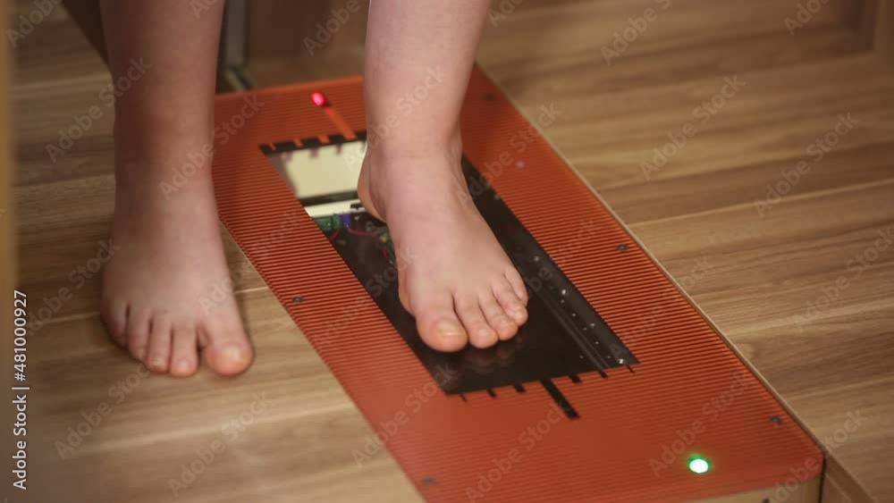 Special orthopedic equipment for feet examination. Female patient