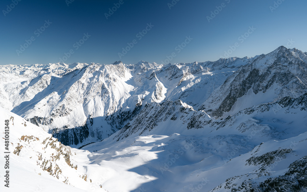 Mountains in Austria in the Alps of Tyrol. Winter landscape and alpine mountain panorama in Europe. Zischgeles Skiing near Innsbruck. High scenery