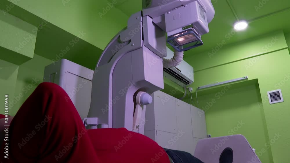 XRay Machine for Scanning His Leg for Injury. Scanning for Fractures