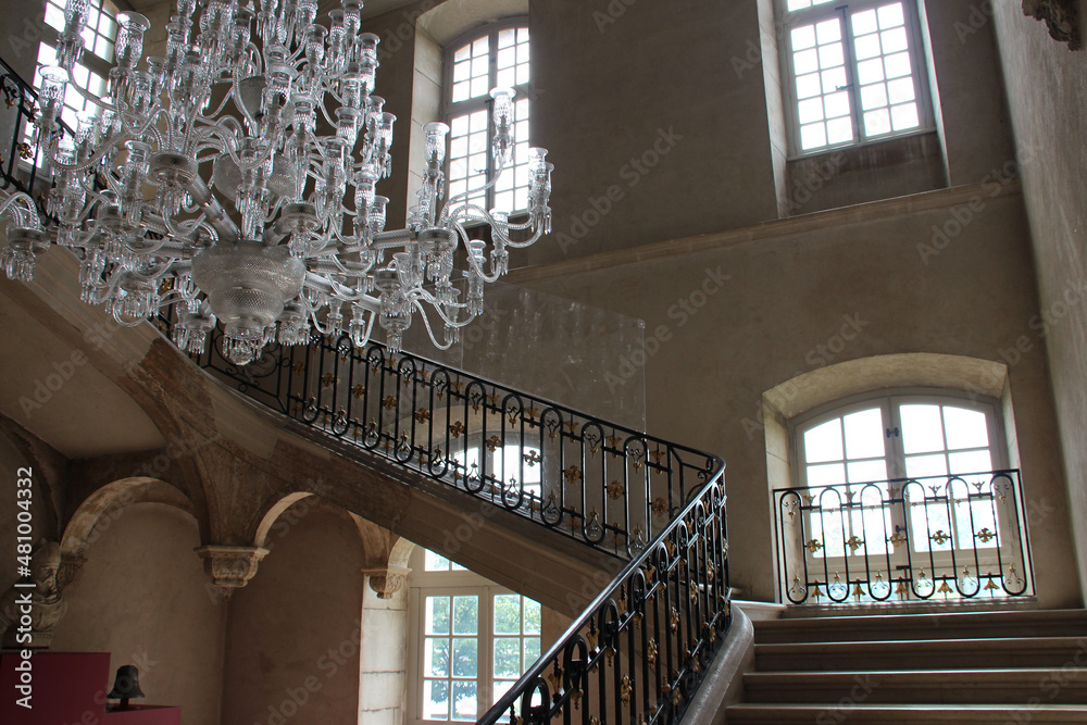 Obraz premium staircase and baroque chandelier at the premontres abbey in pont-a-mousson (france)