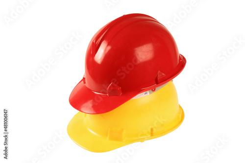 Red and white hard hats as used in construction, on a white background.
