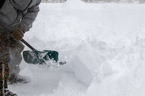 working on shoveling snow  photo