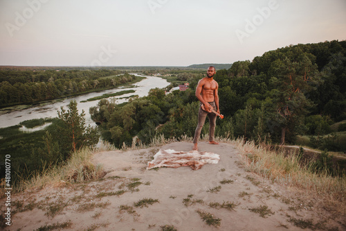 young african american sports man with ukulele