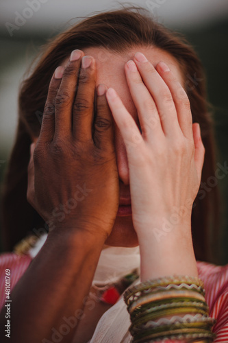 beautiful woman closes her eyes by her boyfriend