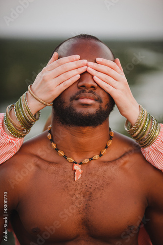 portrait of african american man with european woman hand