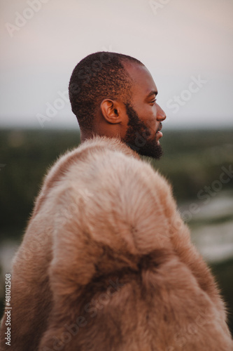portrait of african american man in furs