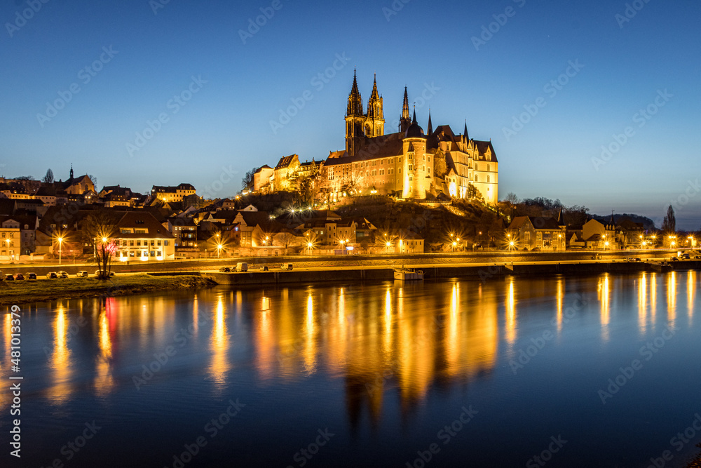 The Albrechtsburg in Meissen after sunset in front of the river