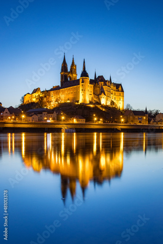 The Albrechtsburg in Meissen after sunset in front of the river