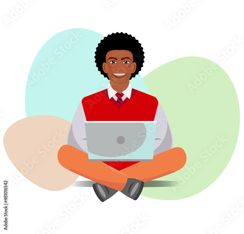 African american young adult in glasses in yoga pose with laptop smiling, relaxation at work or sturdy concept. High quality photo