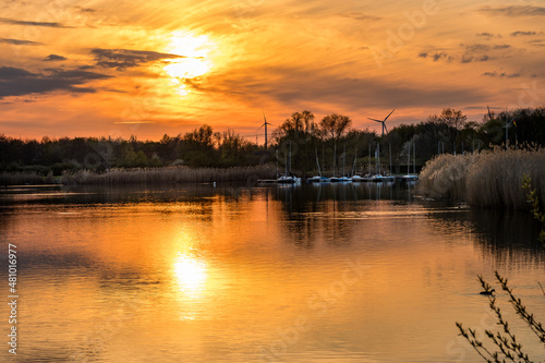 orange red sunset mood at the lake photo