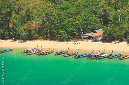 Aerial view of tropical beach with traditional long tail boats on Kho Poda, Khabi, Thailand photo