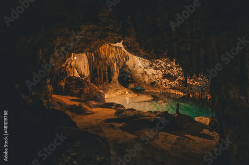 underground cenote with stalactites and stalagmites