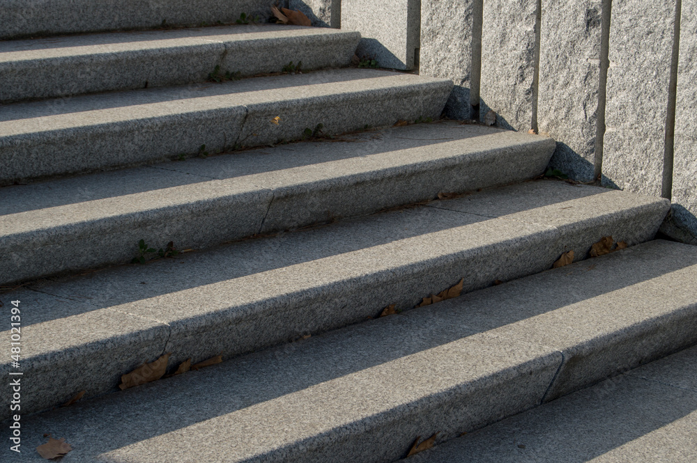 stone stairs with shadow next to a wall stone stairs with shadow next to a wall