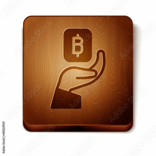 Brown Hand holding Bitcoin icon isolated on white background. Blockchain technology, digital money market, cryptocoin wallet. Wooden square button. Vector