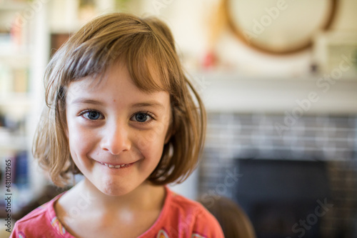 Portrait of young girl at home. photo