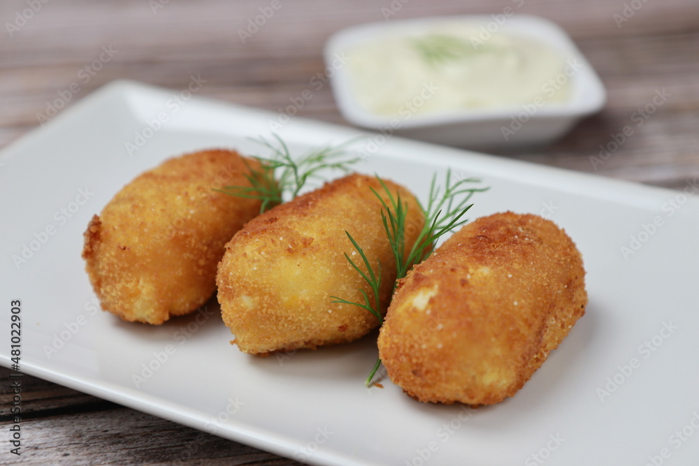 Close up of homemade croquettes, typical spanish dish. Close up of homemade croquettes, typical spanish dish.