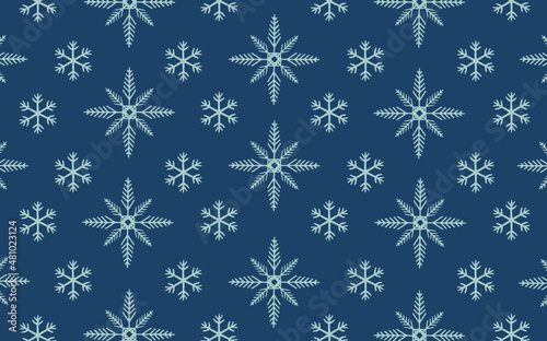Vector. Copos de nieve color plata sobre fondo azul oscuro. Estampado noche estrellada.