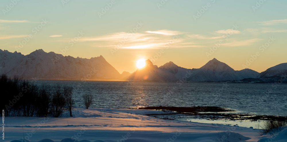 North norway coast winter and snow landscape during sunset