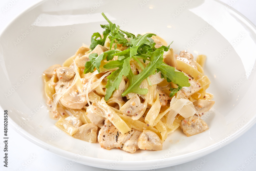 Italian pasta with chicken, cheese and vegetables.