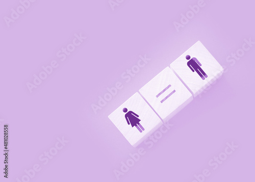 Concepts of gender equality. wooden cubes with female and male symbol and equal sign. Equal pay social quaranty concept photo