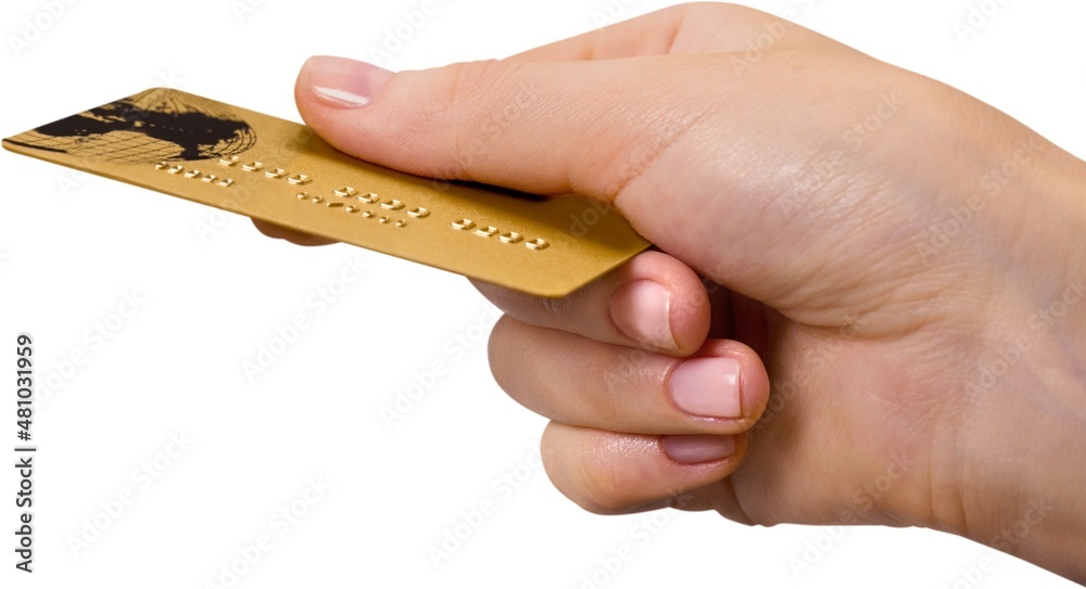Fototapeta premium Human hand holds credit card