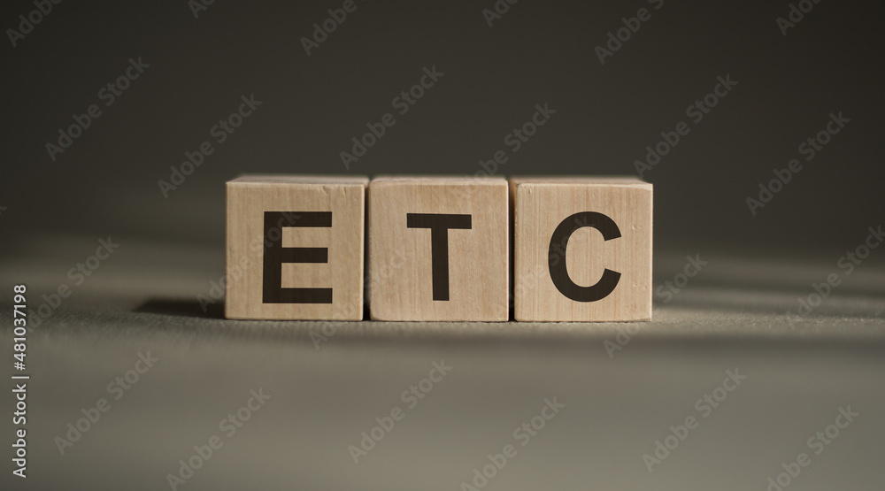 Alphabet letter in word ETC is abbreviation of et cetera written in cubes StockFoto Adobe Stock