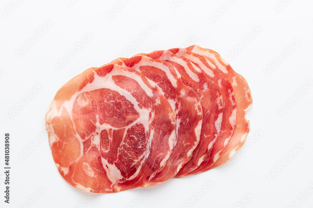 Italian prosciutto crudo or jamon. Raw ham. Isolated on white background. Italian prosciutto crudo or jamon. Raw ham. Isolated on white background.
