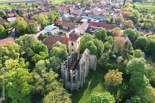 Unfinished Gothic cathedral of Our Lady founded in the 12-th century in the village Panensky Tynec, Czech republic - magical place full of natural healing Energy aerial scenic panorama view photo