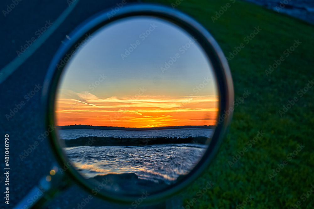 Sunset in Motorcycle Rear View Mirror Sunset in Motorcycle Rear View Mirror