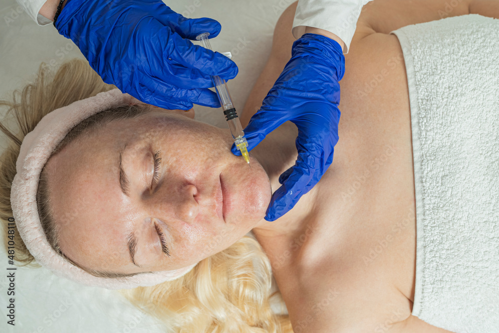 Anti-wrinkle surgery. An injection of the beauty of a young woman. Facial treatments. Anti-wrinkle surgery. An injection of the beauty of a young woman. Facial treatments.