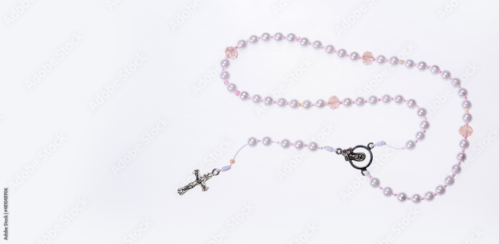 Fototapet Holy catholic rosary and a cross - Text space