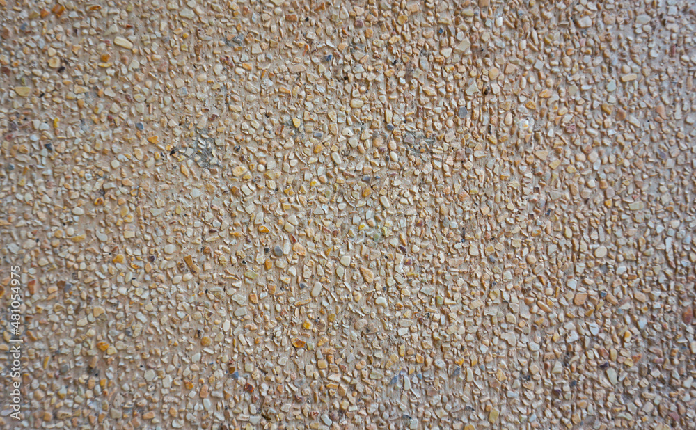 Fototapeta premium A stone-concrete surface next to a wall for backgrounds or other design illustrations and artwork.