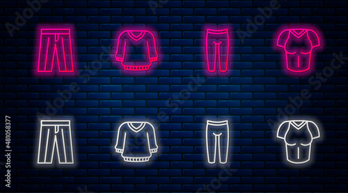 Set line Sweater, Leggings, Pants and T-shirt. Glowing neon icon on brick wall. Vector