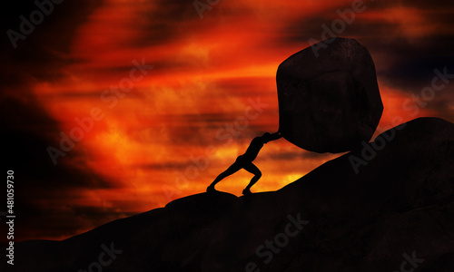 Canvas Print Young man Pushing uphill Big Rock At sunset