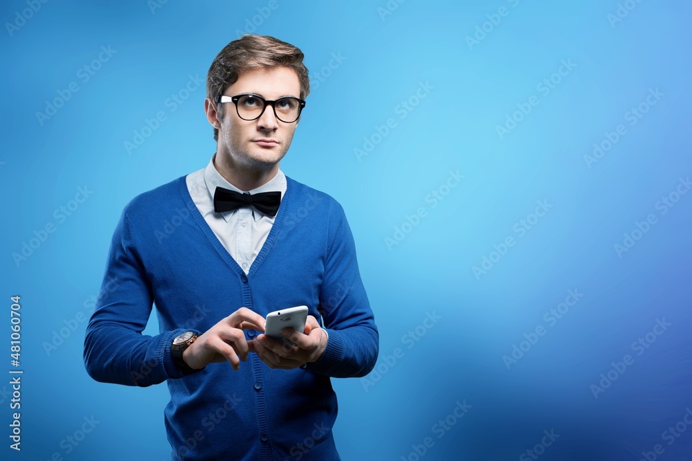 Young man typing sms, internet concept, high speed internet on phone
