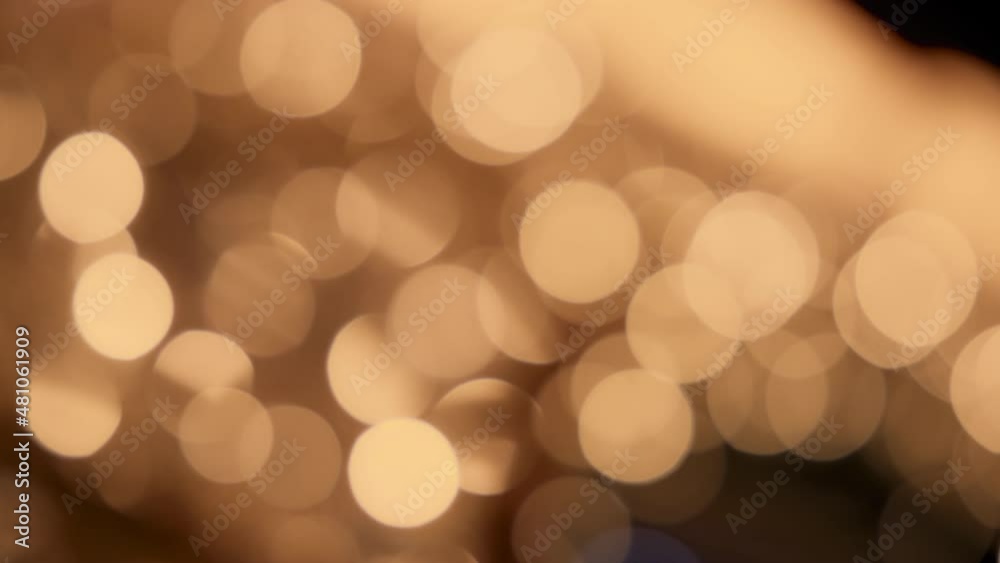 Abstract blurred defocused golden lights background. 