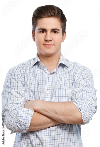 friendly man with arms crossed