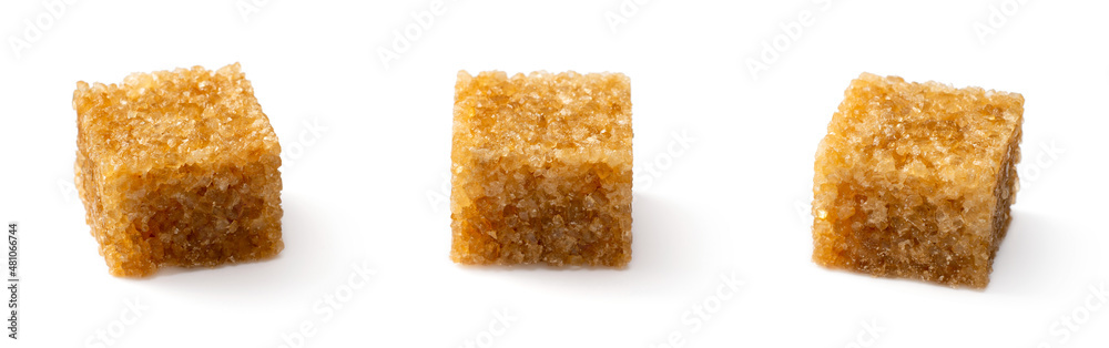 Brown sugar cubes isolated on white background Brown sugar cubes isolated on white background