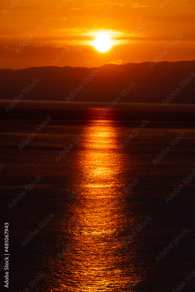 sunset over the sea sunset over the sea