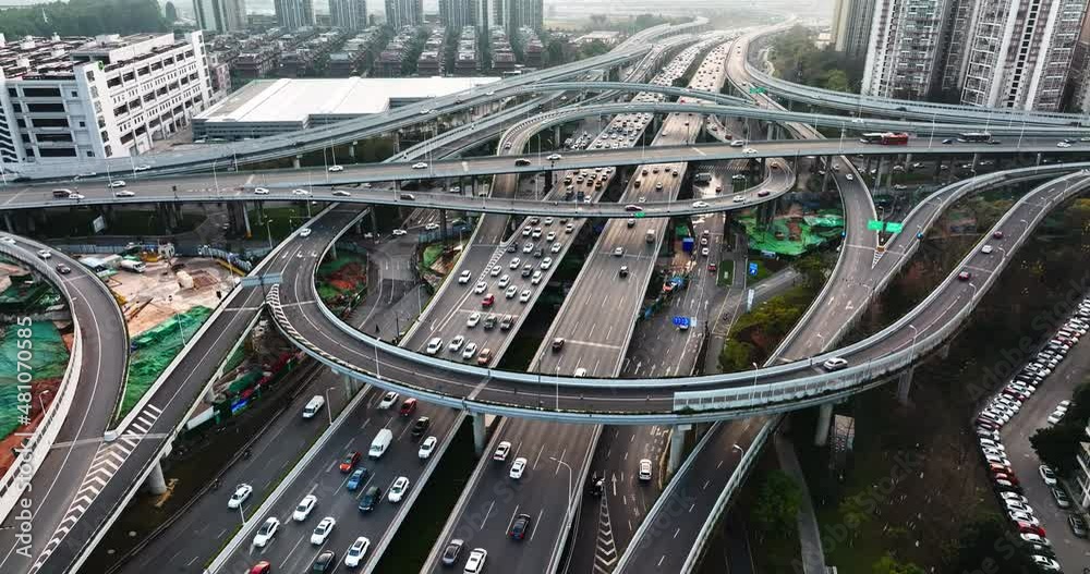 Aerial view of busy city traffic on the road cars driving on the overpass third ring road during rush hour of Chengdu China multi-storey highway Aerial view of busy city traffic on the road cars driving on the overpass third ring road during rush hour of Chengdu China multi-storey highway