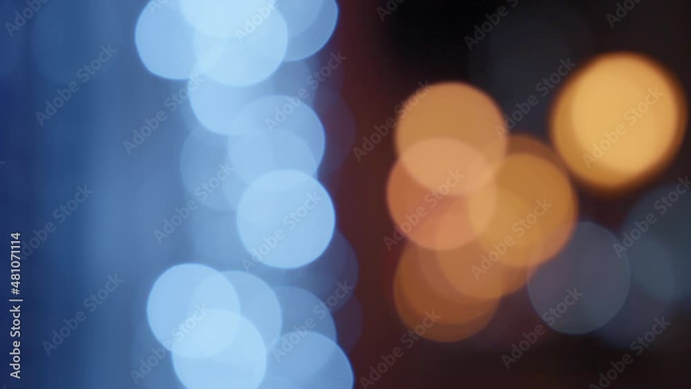 Blurred bokeh lights background of night city at Christmas time. Blurred bokeh lights background of night city at Christmas time.