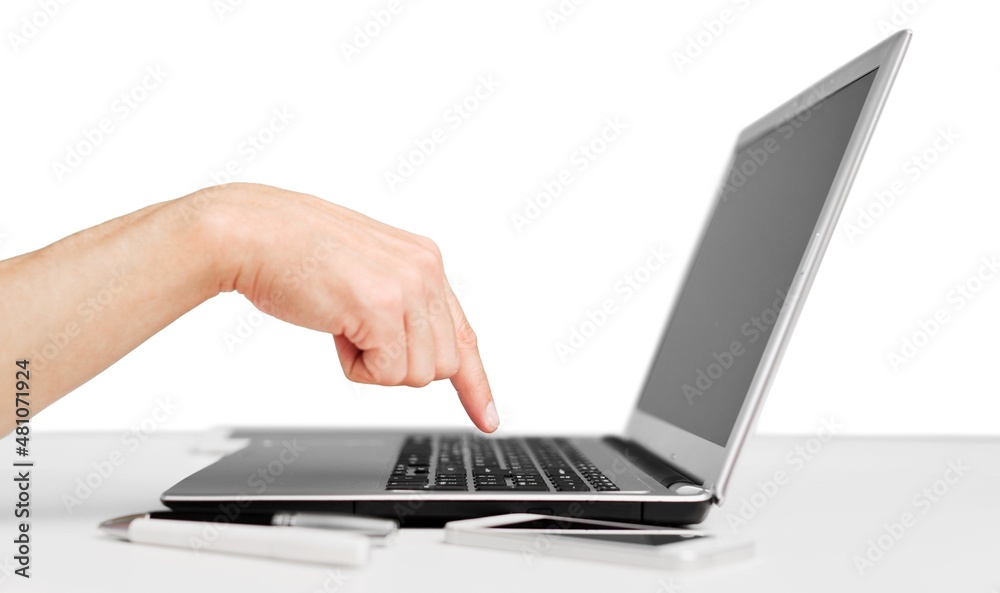 Man hand working on a laptop with blank screen monitor Man hand working on a laptop with blank screen monitor