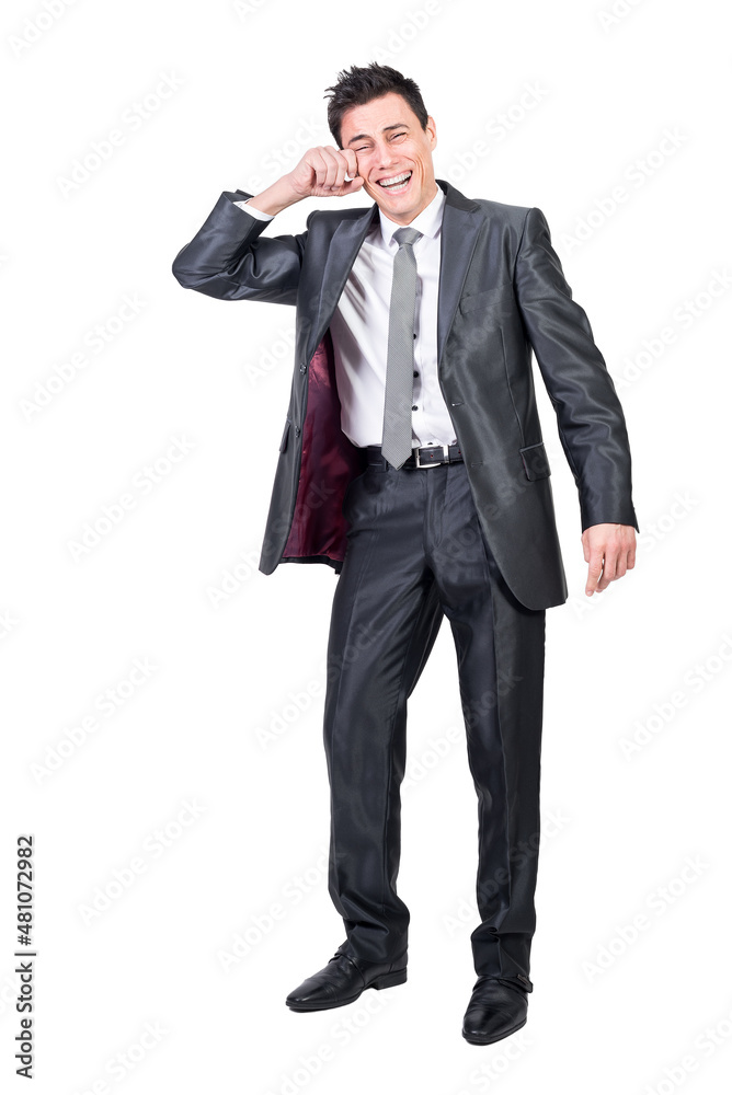Cheerful office worker wiping tears while laughing Cheerful office worker wiping tears while laughing