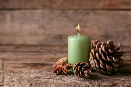 Green pillar candle with pi...